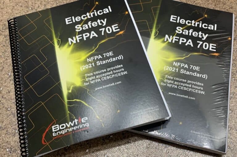 Two books on electrical safety titled NFPA 70E, covering arc flash study requirements for safe electrical practices.
